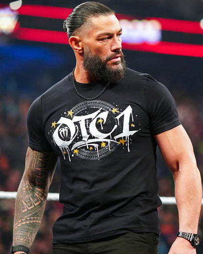 Polera Roman Reigns Gold OTC1 WWE 2026
